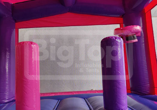 Commercial-grade pink castle bounce house for events