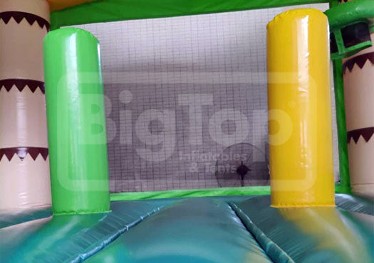 Inflatable play structure with green and yellow panels and 'Big Top' branding.