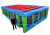 Inflatable pool with red interior and blue and green exterior, standing next to a person for scale.