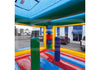 A colorful inflatable bounce house inside view with safety exit designed to look like a giant building with a castle-like structure on top, featuring a vibrant red, yellow, green, and blue color scheme with a transparent front panel.