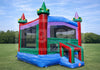 Colorful inflatable bounce house with castle design on a grassy field