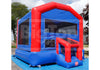 A red and blue inflatable bounce house with a small attached slide, photographed outdoors on a blue ground cover with trees and sky in the background. A large semi-transparent 'BigTop' watermark is visible across the center.