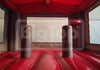 Red inflatable bouncy castle interior with 'BigTop Inflatables & Tents' branding.
