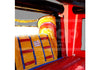 Close-up of a colorful inflatable slide with red, yellow, and blue patterns.