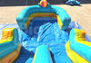 Inflatable water slide with colorful design on a concrete surface