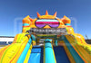 Colorful inflatable slide with goggles against a clear blue sky