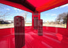 Red inflatable bounce house with 'B' Tic Inflatables & Tents' branding, showing the interior with a clear sky outside.