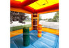 An inflatable bounce house with a blue padded floor, orange and yellow ceiling, and two cylindrical punching bags, shown with an outdoor street scene visible through the side windows.