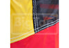 Close-up detail of a safety flag showing yellow, red, and black sections with white contrast stitching.