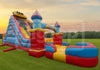 Colorful inflatable water park on grass with a sunset sky