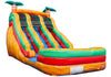 Colorful inflatable water slide with tropical design on a white background