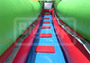 Inflatable slide with green, red, and blue colors