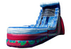 An inflatable water slide playground with a blue and white water-textured slide, a red and purple base, and green circular accents, isolated on a white background.